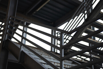 Metal overpass platform with banister structure of the factory place. Industrial building part....