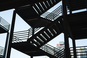 Metal overpass platform with banister structure of the factory place. Industrial building part....