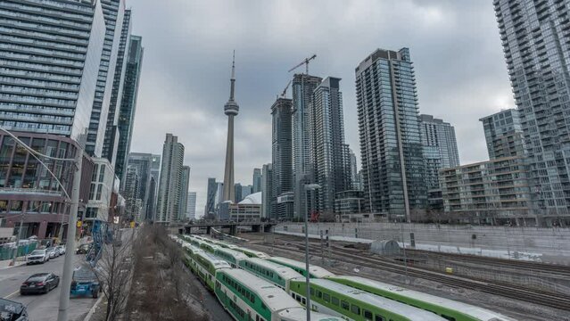 Train Station And Downtown Toronto Skyline In Daytime With CN Tower And High-rises In View. timelapse