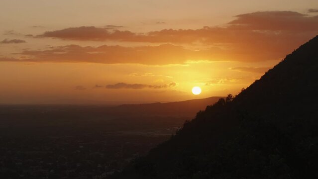 Beautiful sunset with mountain silhouette in Jamaica, Kingston