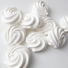 Obraz na płótnie Canvas Closeup of white creamy marshmallow isolated on white background
