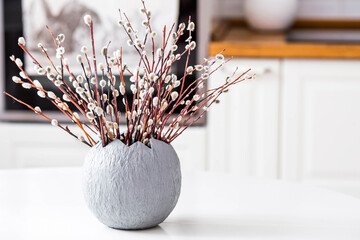 A bouquet of willow twigs for the Orthodox Palm Sunday holiday. Willow in a gray egg in the...