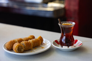 After Cag Kebap Traditional Turkish Dessert 'Erzurum Kadayif Dolmasi' and Turkish Tea Photo, Erzurum Turkiye (Turkey)