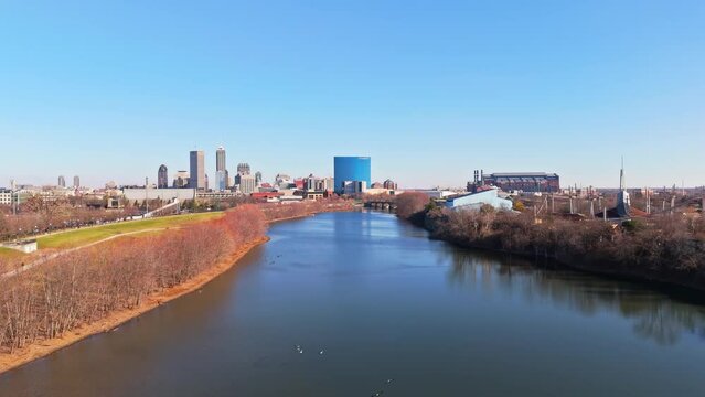 Sunny peaceful day across the White River towards the Indy Downtown Skyline.