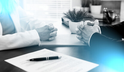 Business negotiation between businesswoman and businessman (lorem ipsum text used); light effect