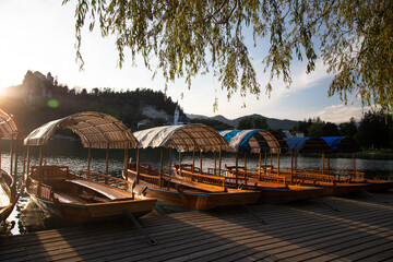 Pletna rowing boats on the alpine Bled lake, Slovenia, Europe