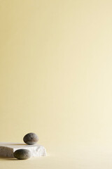 Pastel toned background with broken stones and natural objects.