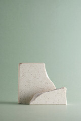 Pastel toned background with broken stones and natural objects.