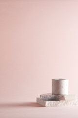 Pastel toned background with broken stones and natural objects.