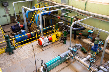 Electric pumps in a wastewater treatment facility - obrazy, fototapety, plakaty