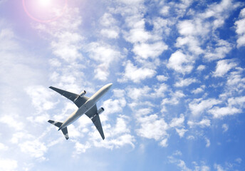 Horizontal nature background with aircraft and Jet trailing smoke in the sky. Airplane and...
