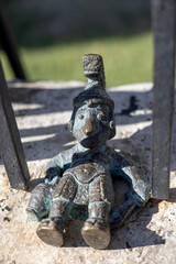 Bronze figurine of roman legionary on the walls of Roman amphitheatre Pula Arena, Pula, Croatia, Istria