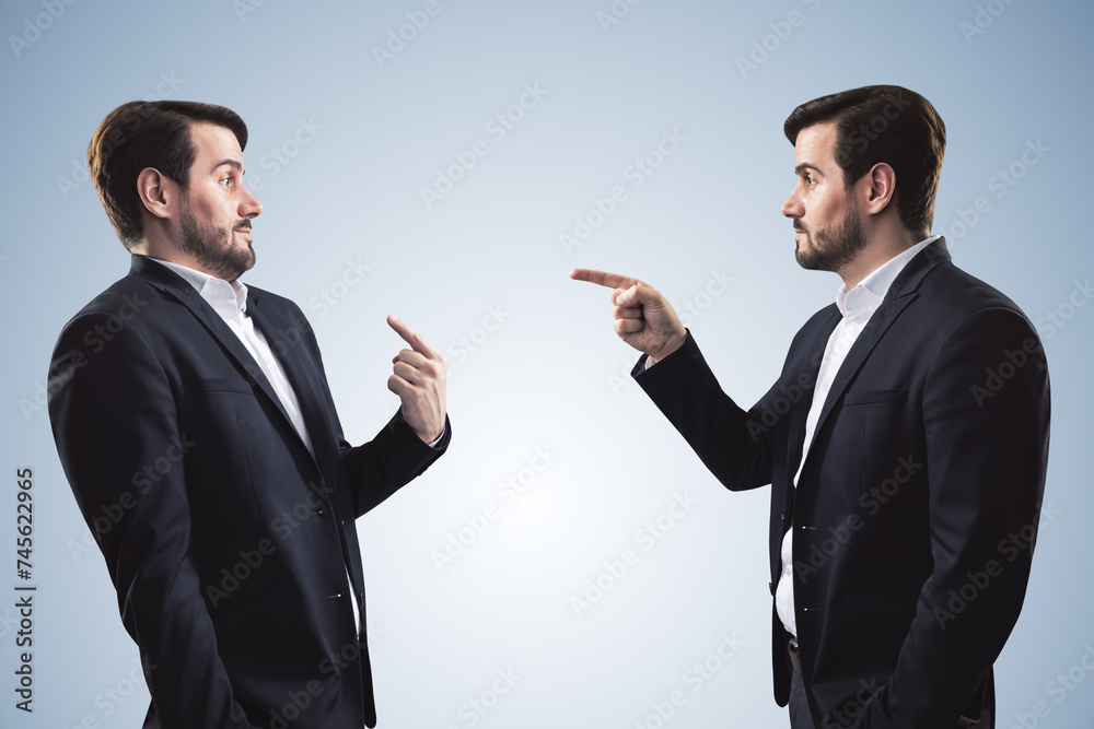 Aufkleber abstract image of boss hand pointing at man on light gray background. bad job decision and mistake c