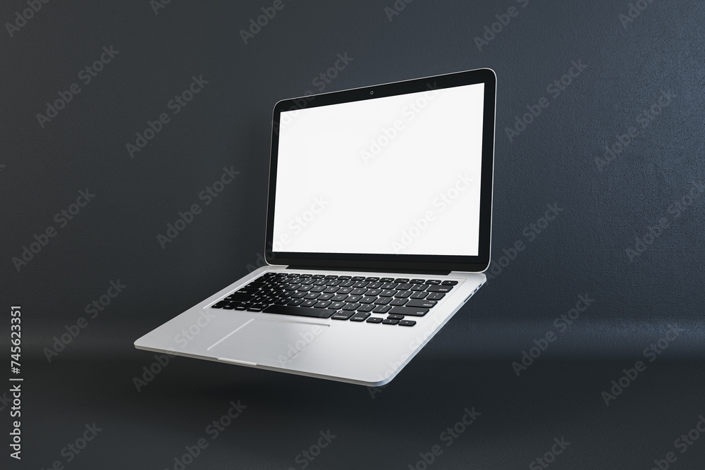Poster Open laptop with a blank screen on a dark textured background, professional workspace concept. 3D Rendering