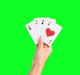 Hand Holding Ace Card, isolated on green screen background. Playing Card game hand poker gambling casino.