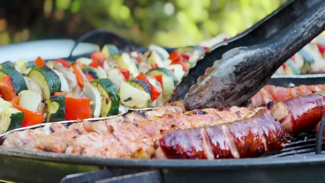 Meat and Veggies on a grill in the garden