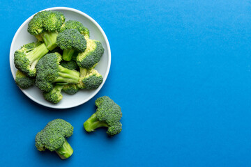 broccoli of fresh green broccoli in bowl over coloredbackground. , close up. Fresh vegetable