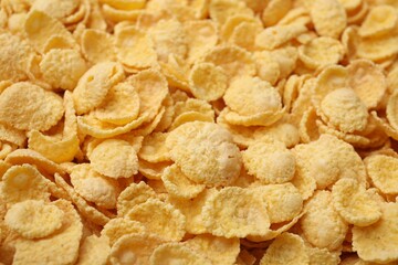 Breakfast cereal. Tasty sweet corn flakes as background, closeup