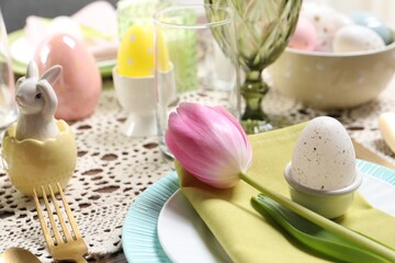 Festive table setting with beautiful tulip, closeup. Easter celebration