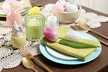 Obraz na płótnie Canvas Festive table setting with beautiful tulip, closeup. Easter celebration