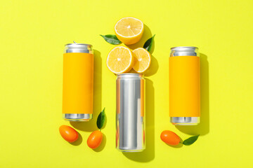 Metal cans with freshly cut juicy lemons