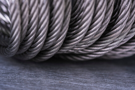 Steel wire rope cable on metal surface