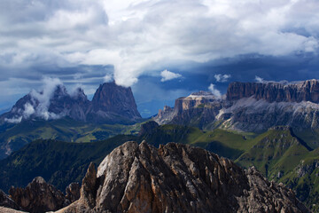 The view of Sassolungo and the Sella Group from Serauta in the Dolomites, Italy.