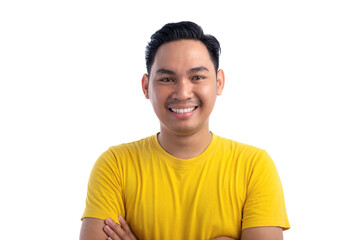 Portrait of handsome Asian man posing with crossed arms and smiling at camera isolated on white background