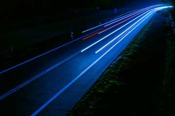 lights of cars driving at night. long exposure