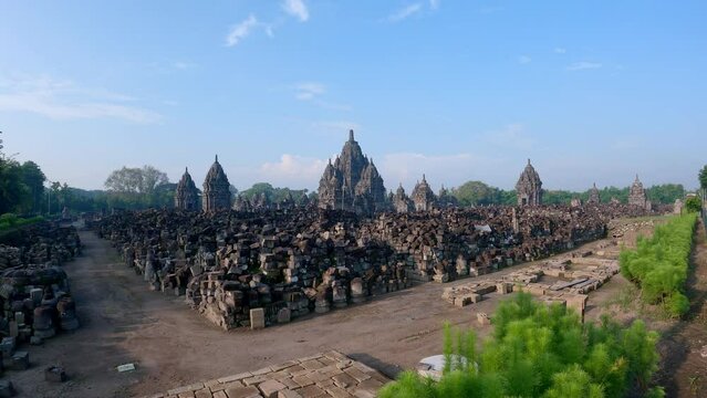 Candi Sewu or Thousand Temple panning shot morning view from right to left with blue sky background