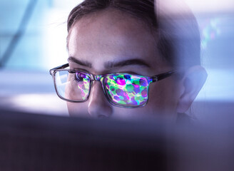 Young scientist examining molecular structure on computer