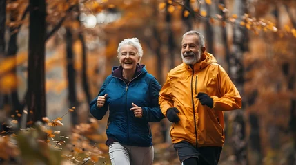 Schilderijen op glas Sweet and happy senior couple jogging for exercise together © Teerapat