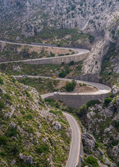 Clouds on the famous winding road in Sa Calobra on the island of Mallorca, Spain. Dangerous road turn in the clouds Travel around the island.