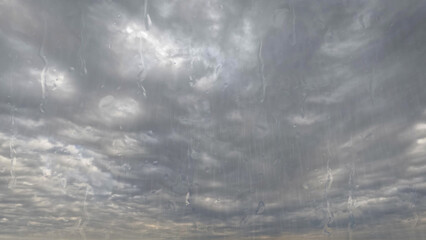 rain on sky with clouds - nice weather background - photo of nature