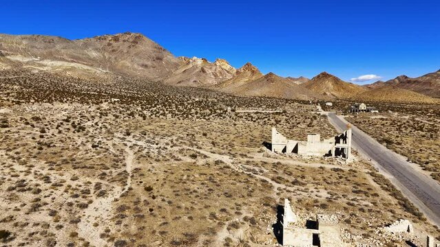 DJI 115911-Aerial-Ghost town ruins-Ryolite, Nevada along Ryolite Road; formerly Golden Street in the day of this once booming mining town. Rhyolite is at the northern end of the Amargosa Desert.