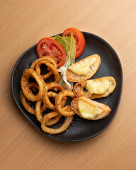 Overhead View of Squid Dish on Wooden Surface