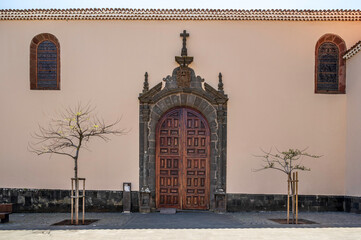 Ancient wooden door to the Immaculate Conception Church, in the old city of La Laguna, Tenerife (Spain). The full name of the church is: Iglesia-Parroquia Matriz de Nostra Señora de La Concepción