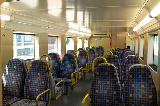 Interior of subway train with empty seats