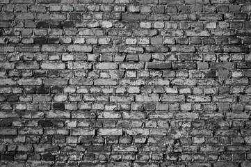 old brick wall close up in gray color
