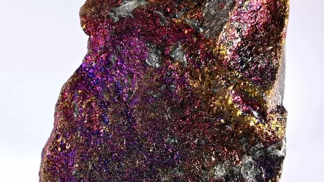 Peacock Ore / Bornite / Chalcopyrite (copper ore) sample rotating against a white background	
