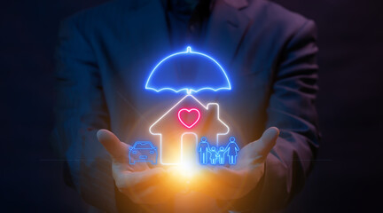 Businessman showing glowing neon line of heart house, car, and family under an umbrella. Insurance and security concept.