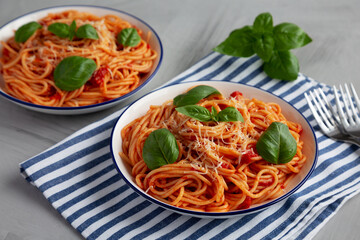 Homemade Pasta Pomodoro on a Plate, side view.