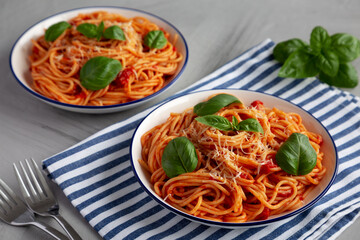 Homemade Pasta Pomodoro on a Plate, side view.