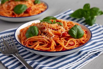 Homemade Pasta Pomodoro on a Plate, side view.