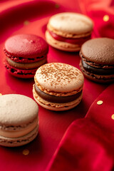 Fototapeta premium beautiful curated French macarons baked for cafe bakery patisserie with pastel pink flatlay background in different colorful flavours magazine editorial photography pastry, dessert pink