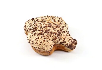 Colomba Pasquale, typical italian easter cake, coated with chocolate chips. The name means Easter Dove in english language, due to its shape. White background.