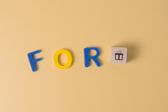 The arranged objects for meaning words 'FORGIVE likes a GIFT'