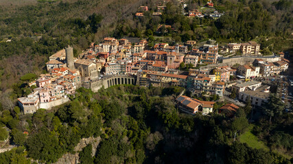 Aerial view of Nemi, a town and comune in the Metropolitan City of Rome, Italy. It is located in the Alban Hills. The historic center is included in the Castelli Romani regional park.