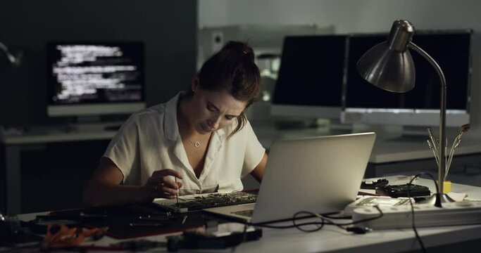 Laptop, motherboard and woman stress over repair problem of computer hardware, electronics or semiconductor. Crisis, night and technician frustrated with microchip, circuit board fail or CPU glitch