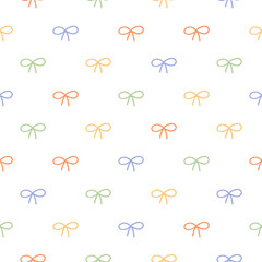 Seamless pattern with colorful bows